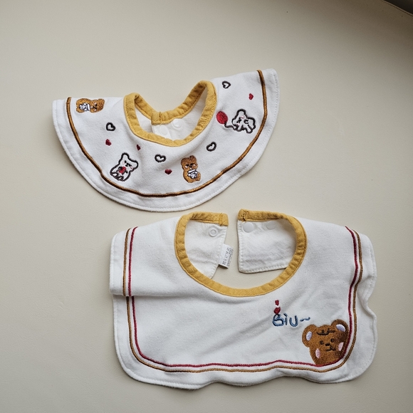 White and Yellow Bibs with Cute Embroidered Designs - Picture 1 of 10